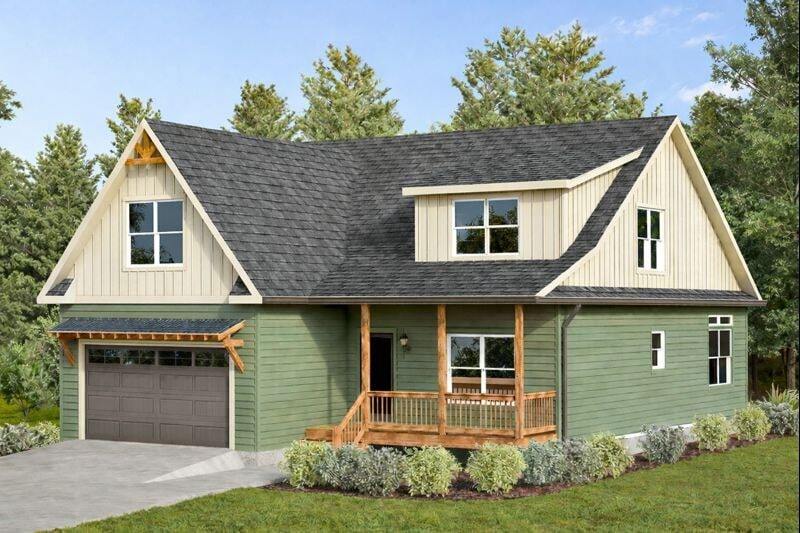 Beautiful Alpine-style home featuring green siding, a gabled roof, and wooden porch accents, set in a lush wooded environment. Perfect for custom mountain living.